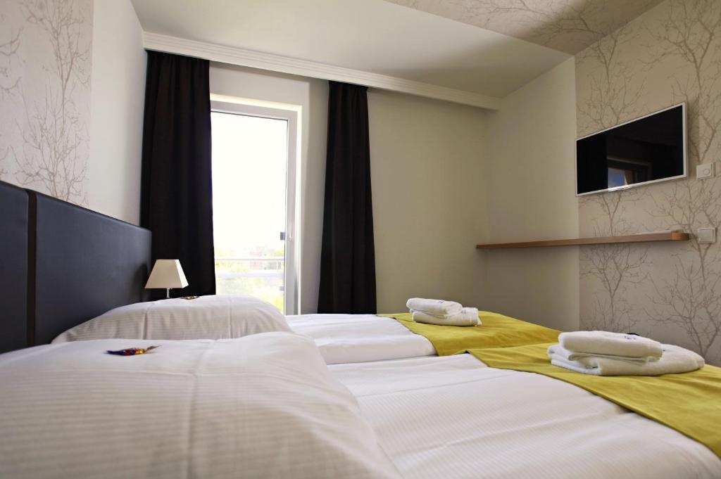 Hotel Warnow Rostock Oda fotoğraf